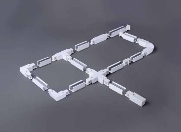 картинка Коннектор X-образный для трехфазного шинопровода TRC-1-3-X-WH белый от магазина BTSvet